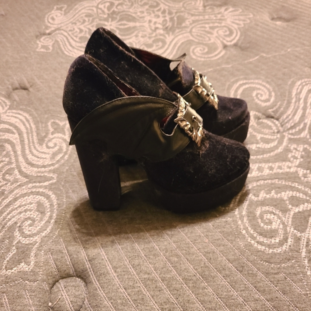Iron fist bat wing high heels